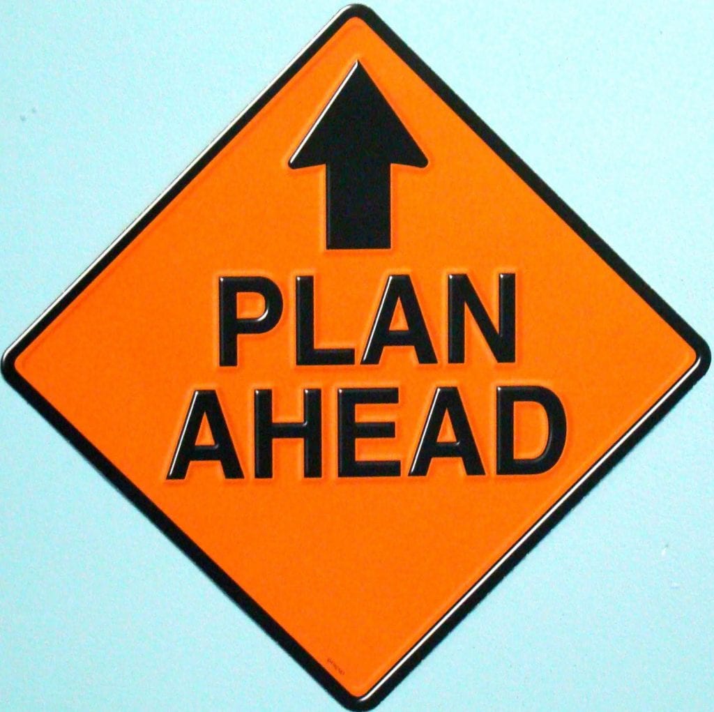 a street sign that says Plan Ahead on it